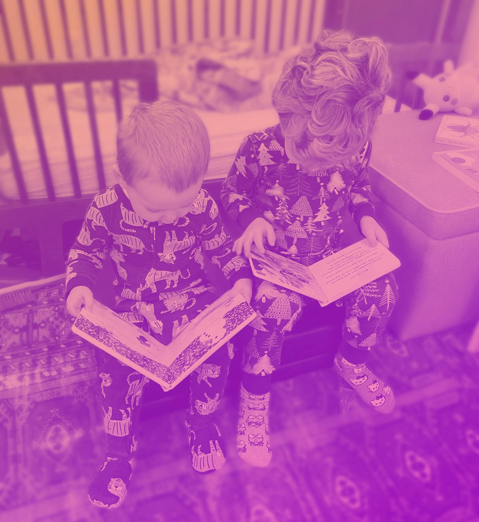 two young kids reading
